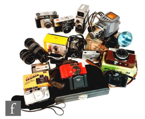 A collection of cameras and related lenses and equipment to include a Tamron zoom macro BBar Mult C. 1:4.5 f=85 210mm No.7741