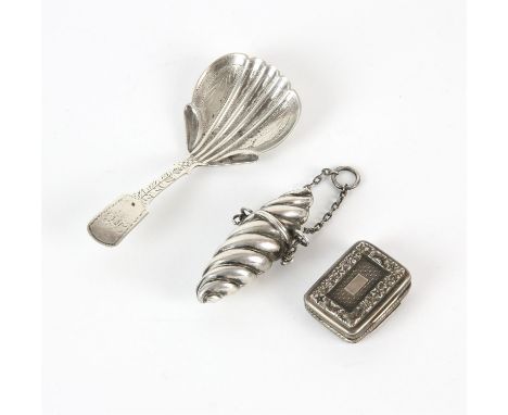 Victorian smelling salts container on suspension chain, Birmingham 1888, George III vinaigrette, London 1817 and a caddy spoo
