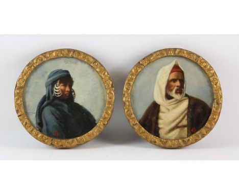 Follower of Frederick Goodall, Study of an Arab man; Study of a woman, oil on vellum, both signed with monogram EC, each 19.5