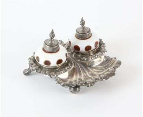 Continental embossed whit metal inkstand with cased glass inkwell and shaker