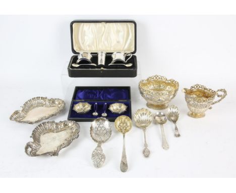 Cased pair of late Victorian silver salts with spoons by William Devenport , Birmingham 1899, cased three piece cruet set wit