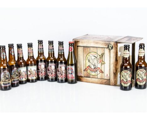 Iron Maiden Trooper Beer Bottles, thirty-eight empty Beer Bottles with a variety of tops comprising twelve 'Red N Black' (In 