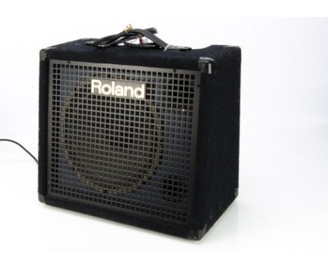 Roland Mixing Amplifier, a Roland KC-100 mixing keyboard amplifier and speaker S/N ZN60304, power and jack lead present, exce