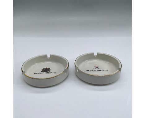 Two cream coloured ashtrays with Benson &amp; Hedges logo and gold rim. Dimensions: 1"H x 4"diaCondition: Age related wear.