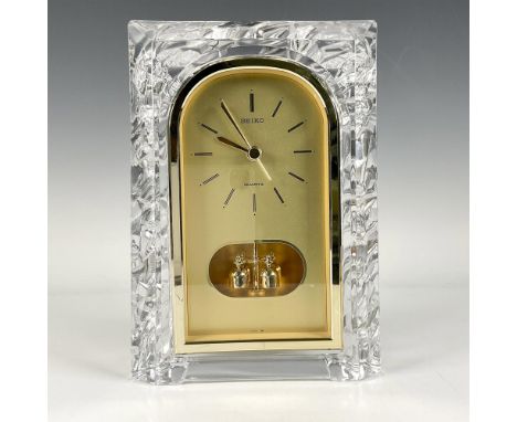 Original retro Seiko quartz lead carved crystal mantle/desk clock with a gold color pendulum. Reference: QQZ127S. Cal. 28102.