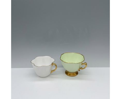 Adorable duo of English made gilded cups with curvy rims from Hammersley 4.75"L x 3.75"W x 2.75"H and Shelley 4"L x 3.5"W x 2