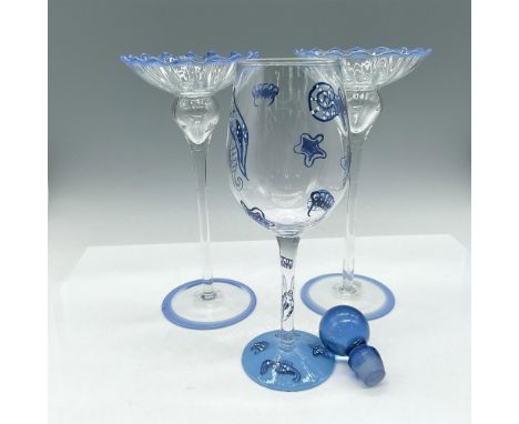 Assortment of clear glass with blue accents. Lot includes round blue stopper 2.5"H, tall wine glass designed with blue seashe