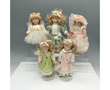 Collection of small figures including 2 Russ dolls of May 4"L x 4"W x 8"H and June 4"L x 4"W x 8"H, a Collectors Choice by Da