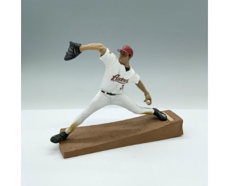 Andy Pettitte plastic figurine on a baseball field base. Dimensions: 7.75"L x 3"W x 6"HCondition: Age related wear.