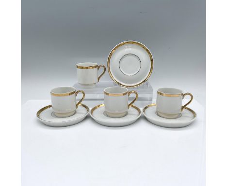 Set for 4. 4 demitasse cups with 4 saucers. White porcelain with 24Kt gold trims. Marked in gold Royal Crown. A cup: 3"L x 2"