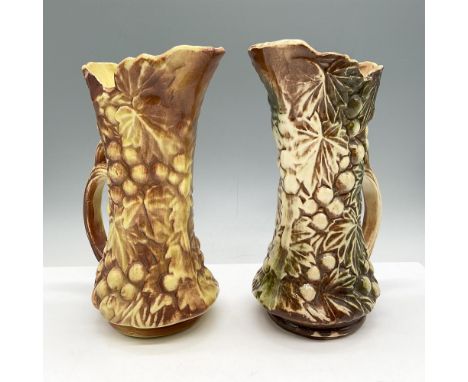 Raised, molded handmade, hand painted pitchers, colored in brown, golden brown and green with leaf and grape design. McCoy ra