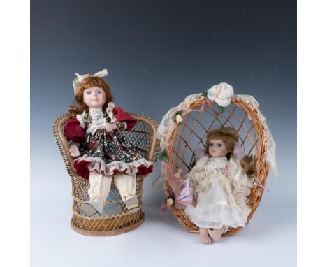 Lot includes Goldenvale Collection porcelain doll in wicker egg chair 10.5"L x 9.5"W x 13.75"H and porcelain doll when plugge