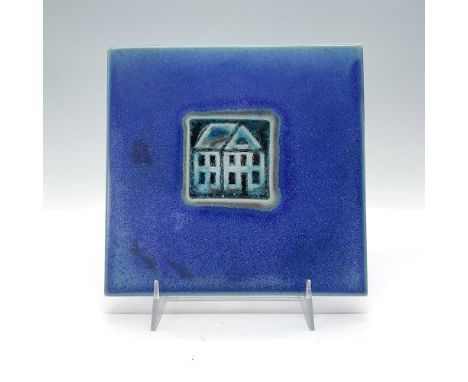 Exquisite handcrafted decorative tile finished in satin cobalt blue, adorned with interior glazed decoration featuring a char
