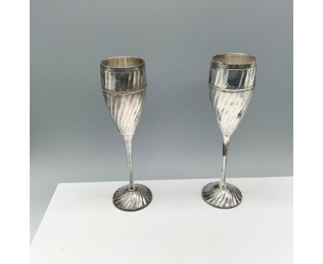 Lovely duo of elegant flutes. This item has its original box (7.75"L x 3.75"W x 11"H). Dimensions: 2.75"W x 9.75"HManufacture