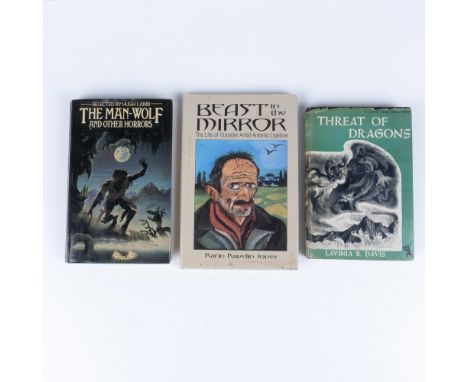 A set of 3 books that includes Threat of Dragons by Lavinia R. Davis, The Man Wolf and Other Horror Stories selected by Hugh 