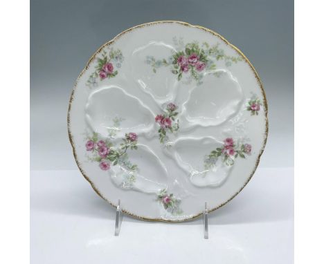 Porcelain oyster plate with a pink flower pattern. GDA Limoges backstamp on the bottom. Issued: c. 1900sDimensions: 8.75"dia.