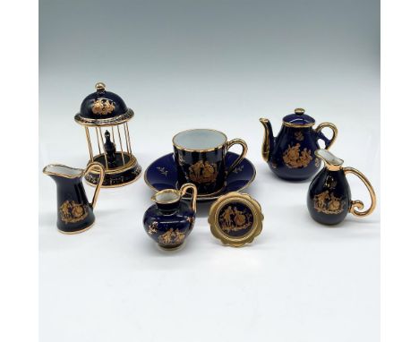 Royal blue porcelain with gilt accents and garden scene motifs. Collection includes Teacup &amp; Saucer; bird cage - marked 2