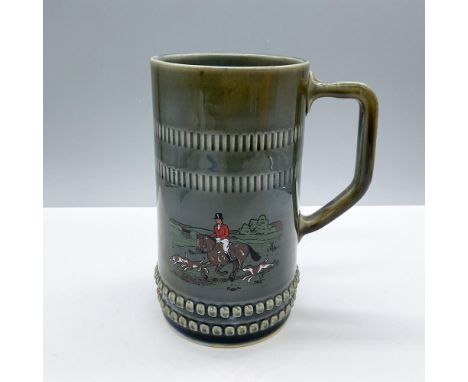 Glossy finish. Features a green stein with relief decoration and a hand painted equestrian hunting scene. Wade Irish Porcelai