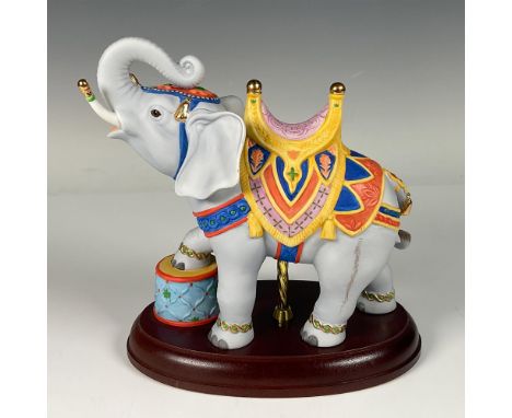 Limited editioned carousel collection porcelain figure featuring an elephant with a drum, intricately designed with meticulou