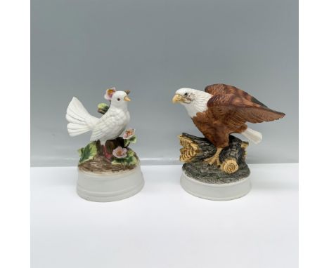 A Milano music box figurine of a white dove perched on a branch in full bloom, and a limited series Royal Heritage bald eagle