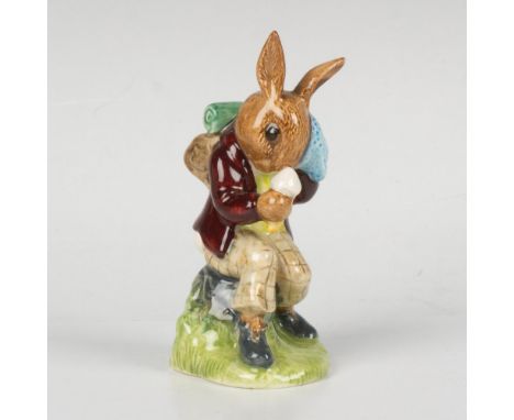A figure of a bunny, taking a break from the heat by wiping off sweat and enjoying an ice cream. This item comes with its ori