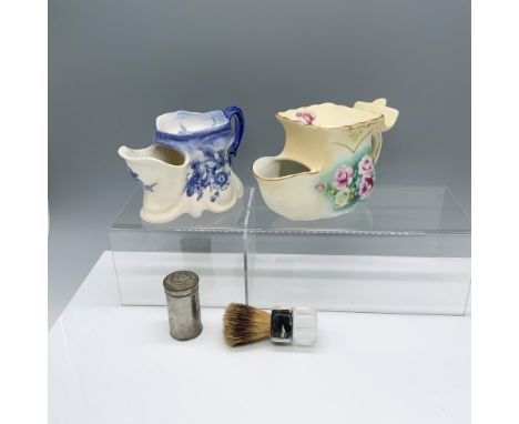 Magnificent pair of porcelain shaving mugs decorated with florals, a Colgate shaving stick container, and a shaving brush. La