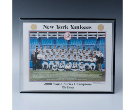 This is a double-sided print from The Record featuring team photos of the 2000 World Series Champion New York Yankees on one 