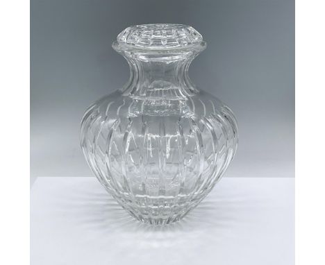 Large heavy cut crystal lidded vase. Pear-shaped with etching running vertically down the sides. Starburst decorated lid. Iss