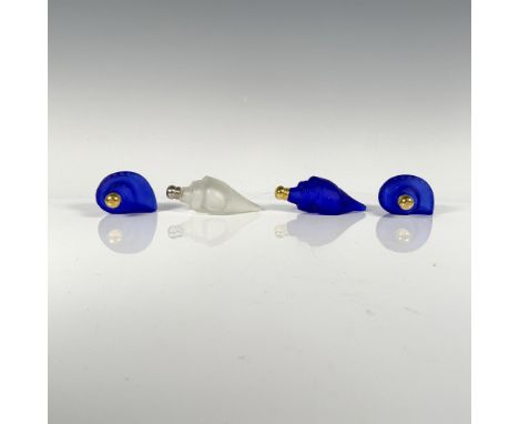 Three cobalt blue seashells capped with gold and one frosted white seashell adorned with silver. Dimensions of the largest it