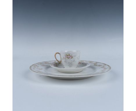 White porcelain adorned with pink blossom garland. Collection includes: 1 plate (9.75"W x 1"H); and 1 tea cup (3.25"L x 2.5"W