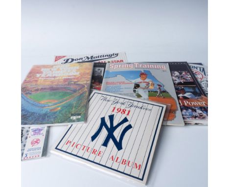 This grouping of Yankees sports memorabilia includes a 1976 AL Championship Series program with ticket stub, a 1980 Yearbook,