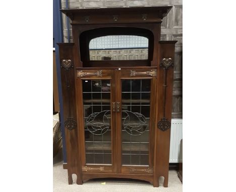 ARTS &amp; CRAFTS MAHOGANY DISPLAY CABINET OF LIBERTY DESIGN, the raised cornice with applied frieze below, open mirrored rec