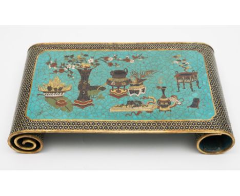 An unusual Chinese cloisonne stand or arm rest: of scroll form, decorated with auspicious objects on a cracked ice turquoise 