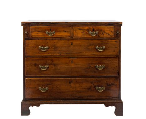 A Georgian yew-wood and inlaid bachelor's chest:, with oak sides, bordered with sycamore lines, the rectangular hinged top wi