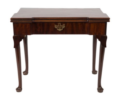 A George II mahogany rectangular card table:, the baize lined hinged top with projecting square candle stands, fitted with a 