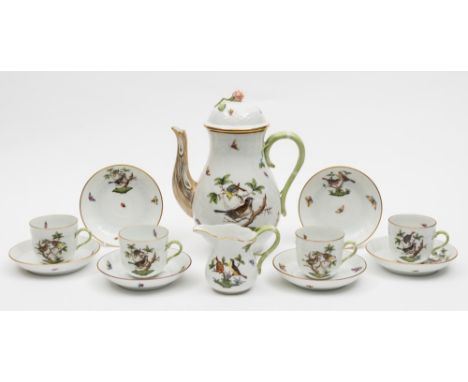 A Herend porcelain coffee service: comprising a coffee pot and cover, milk jug, ten cups and ten saucers, each with rustic ha