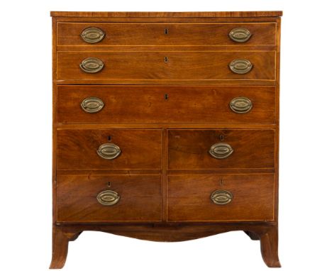 An early 19th Century mahogany and inlaid secretaire chest:, bordered with boxwood lines, the hinged fall enclosing a fitted 