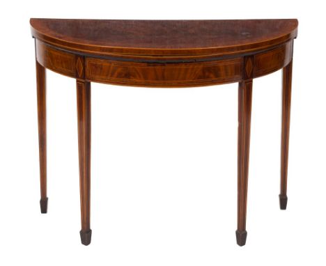 A George III mahogany and inlaid half round card table:, crossbanded in rosewood, bordered with boxwood lines, having a baize