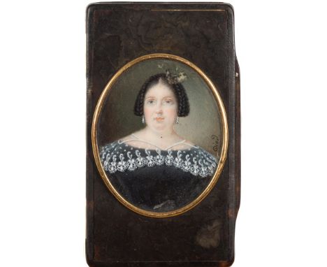 German School mid 19th Century-
A tortoiseshell and horn snuff box, the lid inset with a miniature portrait of a lady, bust-l