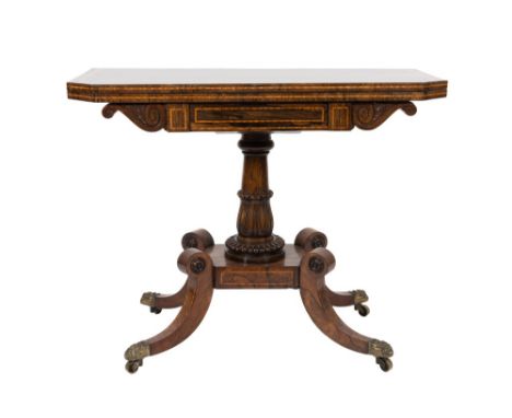 A Regency rosewood and satinwood crossbanded card table: the rectangular baize lined hinged top with canted angles, the panel