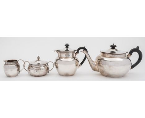 A George V silver four-piece tea service, maker Thomas Bradbury & Sons Ltd, Sheffield, 1922/32: initialled, of plain circular