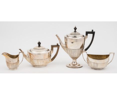 A Victorian silver four-piece silver tea service, maker Walter Barnard & John Barnard, London, 1885/86: of oval form with hal