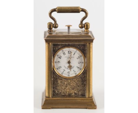 Johannes Hartmann, Berlin, a miniature quarter repeating carriage clock: the eight-day duration timepiece movement with push-