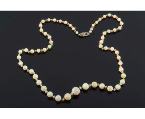 A graduated opal and faceted crystal bead single-string necklace: with opal beads graduated from 4.4mm to 12mm diameter, sepa