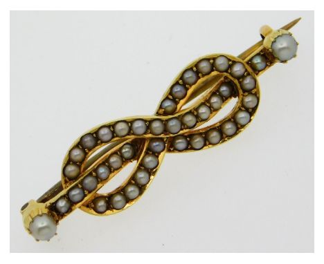 An antique 15ct gold brooch set with pearl, 37mm wide, 3.9g