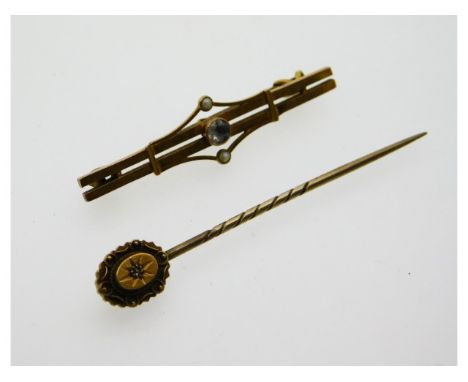 A 9ct gold tie pin set with small diamond twinned with a 9ct gold brooch with white stone, 3.5g