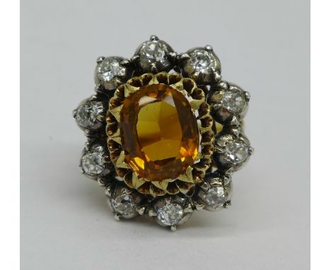 A 19th Century 18ct gold, citrine and diamond cluster ring, 4.67 carat citrine weight, weight 7.8g, size M