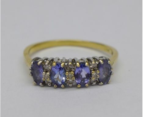 An 18ct gold, tanzanite and diamond ring, weight 3.5g, size T