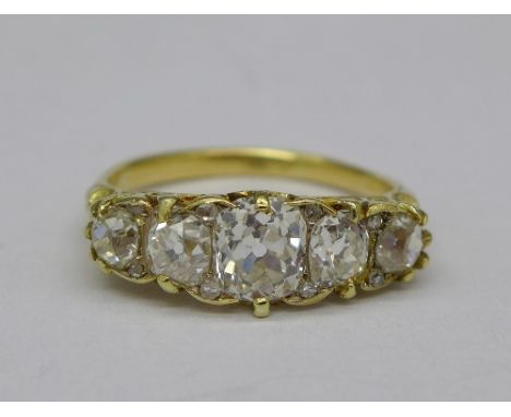 An 18ct gold five stone diamond set ring, approximately 1.9 carat total diamond weight, weight 4.4g, size O