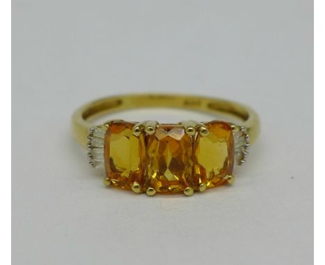 A silver-gilt Madeira citrine ring set with eight diamonds, size L